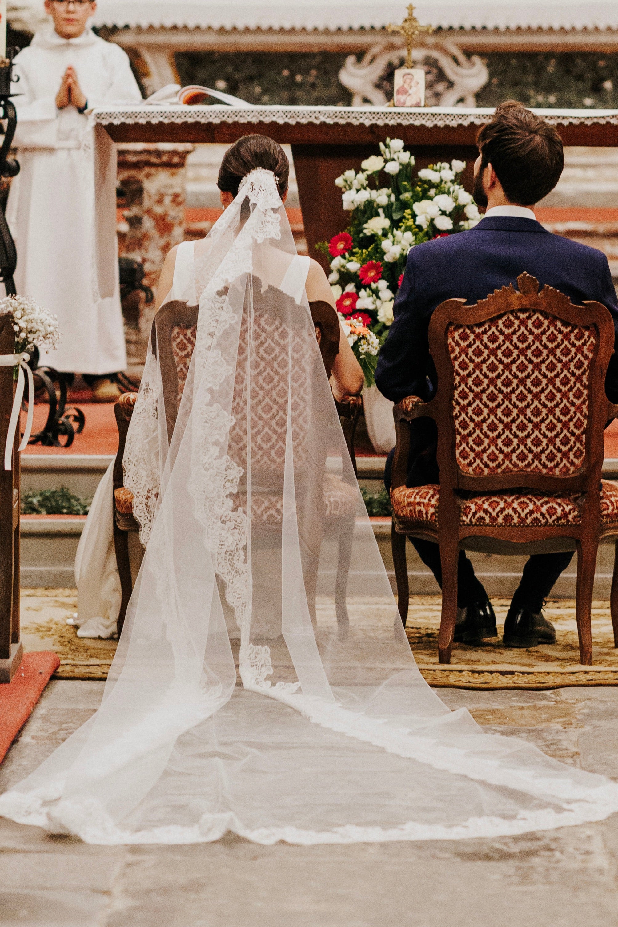 Cathedral mantilla veil combining lightweight tulle and historic Calais lace for a timeless silhouette