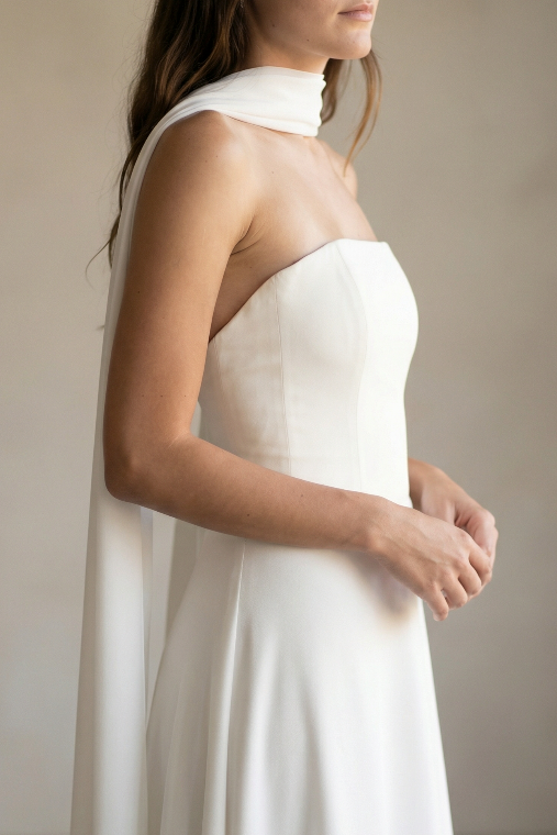Ivory silk bridal scarf worn as a minimalist wedding veil alternative