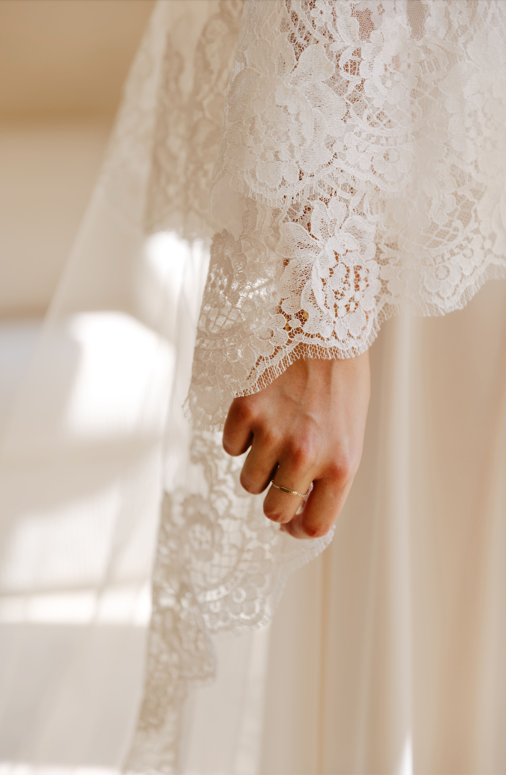 Detail of the lace trim of a cathedral wedding veil