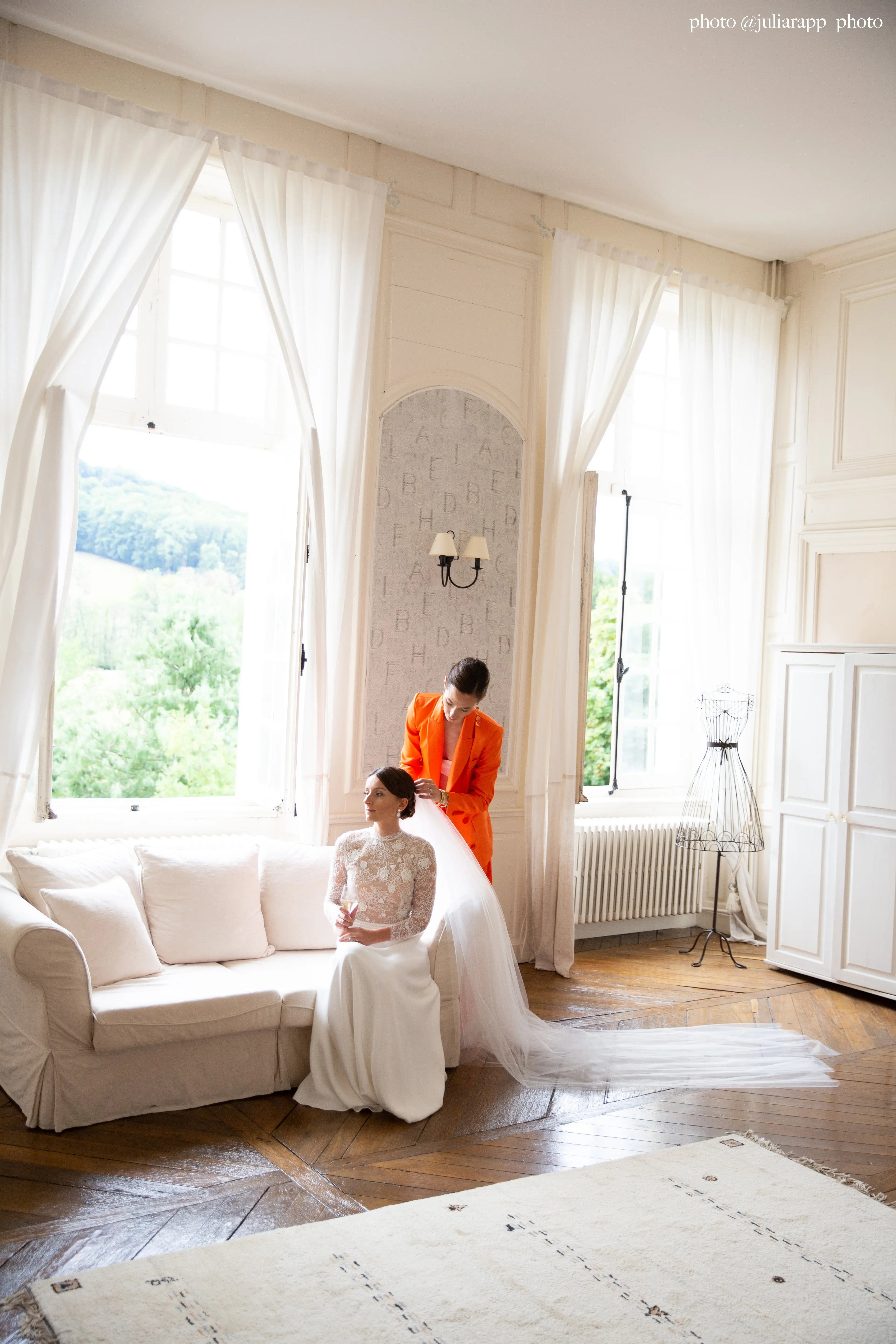 Elegant cathedral-length tulle veil with delicate texture and soft drape.
